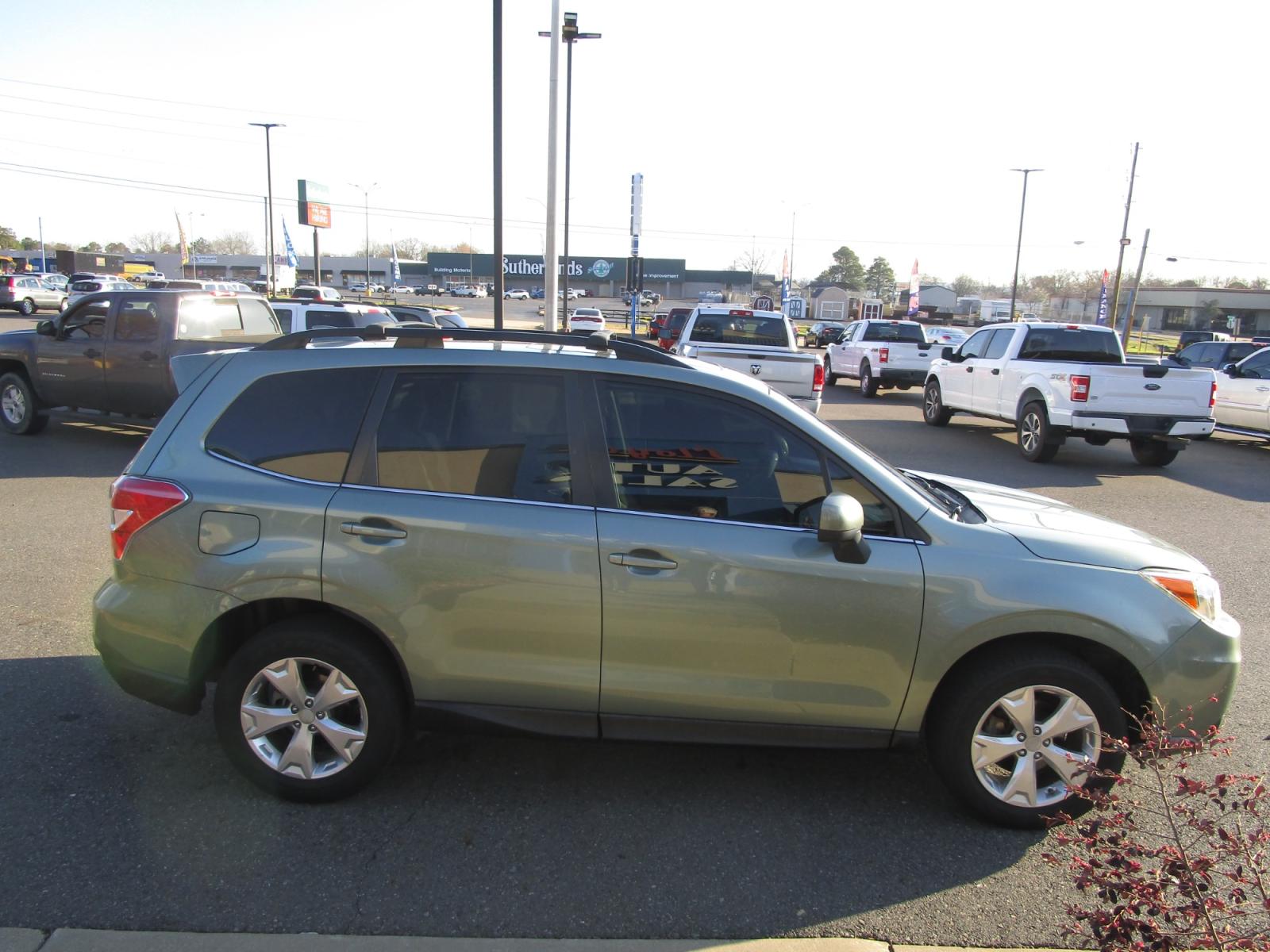 2016 Green Subaru Forester (JF2SJAKC7GH) , located at 1814 Albert Pike Road, Hot Springs, AR, 71913, (501) 623-1717, 34.494228, -93.094070 - Photo #2